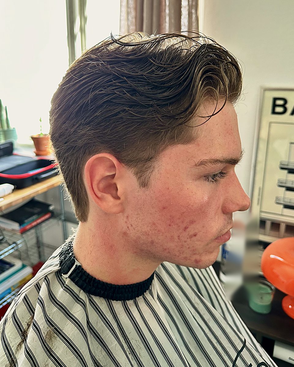 Short swept-back cut with tapered sides