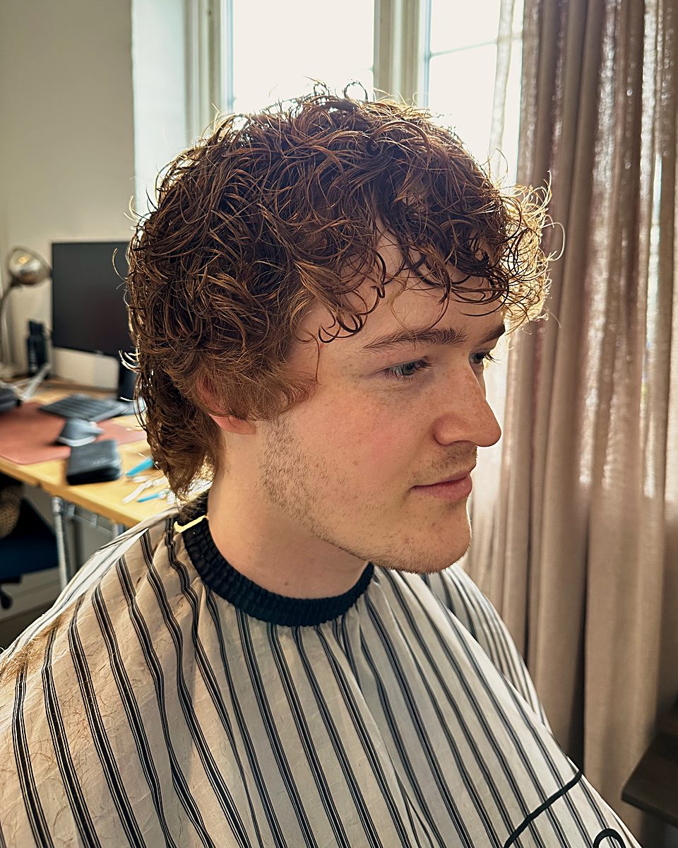 Curly hair with a soft fringe
